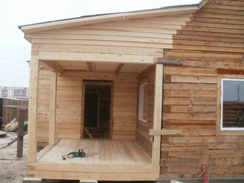 Пристройка к деревянному дому из бруса